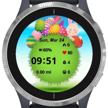 Colorful eggs and bunny on green grass
